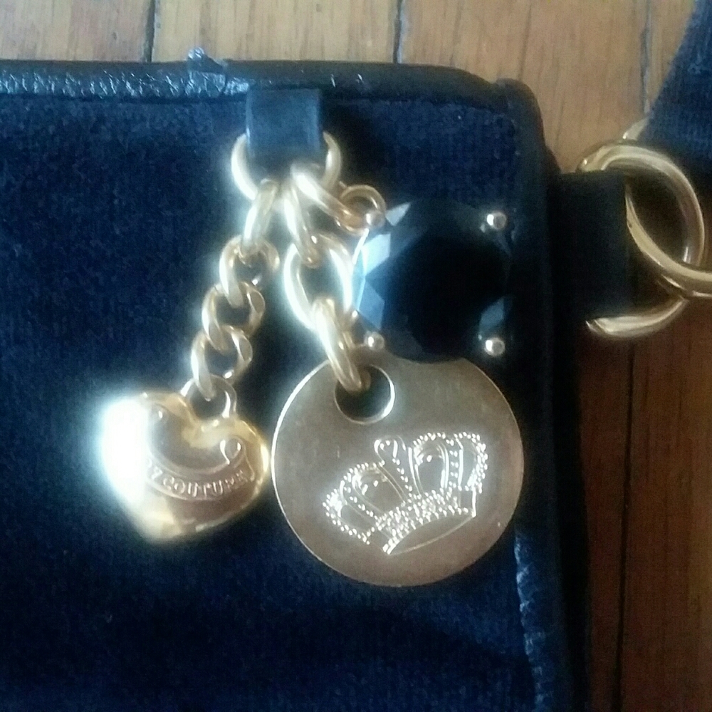 Juicy Couture Black satchel!!!!!!! Poka-Dot Interior soft material
ITEM #1 - Picture 11 of 16